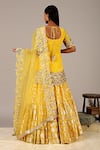 Shop_Nidhika Shekhar_Yellow Crepe U Neck Embellished Kurta Lehenga Set _at_Aza_Fashions