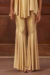 Shop_Dania Siddiqui_Gold Lycra Plain Aya Bell Bottom Pant _Online_at_Aza_Fashions