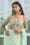 Shop_Kanj by Priyanka A Sakhuja_Green Silk Tabby Hand Embroidered Zari Del Pre-draped Ruffle Saree With Blouse _Online_at_Aza_Fashions