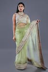 Buy_Divya Kanakia_Green Net Sequins V Neck Saree With Blouse _at_Aza_Fashions