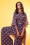 Shop Diyarajvvir Blue Georgette Round Printed Kurta And Pant Set at Aza Fashions Shop_Diyarajvvir_Blue Georgette Round Printed Kurta And Pant Set _at_Aza_Fashions