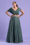 Buy_Two Sisters By Gyans_Green Blouse Lycra, Lehenga Satin Cutdana And Sequin Work Pleated & Top Set _at_Aza_Fashions