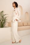 Buy_Arcvsh by Pallavi Singh_Ivory Linen Plain Flared Hem Pant _at_Aza_Fashions