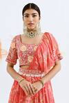 Neha Chopra Tandon_Coral Crepe Tiered Lehenga Saree With Blouse_at_Aza_Fashions
