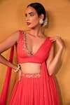 Buy_Esha Koul_Peach Net Embroidery V Neck Embellished Draped Blouse And Lehenga _Online_at_Aza_Fashions