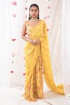 Buy_Esha Koul_Yellow Georgette Embroidered Floral Motifs Scoop Neck Saree With Blouse _at_Aza_Fashions