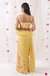 Shop_Esha Koul_Yellow Georgette Embroidered Floral Motifs Scoop Neck Saree With Blouse _at_Aza_Fashions