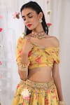 Esha Koul_Yellow Georgette, Semi Crepe Floral Motifs One Shoulder Draped Print Blouse _Online_at_Aza_Fashions