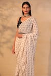 Esha Koul_White Georgette V Neck Printed Ruffle Saree With Blouse _Online_at_Aza_Fashions