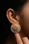 Shop_The Bling Girll_Gold Plated Stones, Cut Work Kundan Studded Floral Motif Round Earrings _at_Aza_Fashions