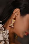 Shop_The Bling Girll_Gold Plated Stones, Beads, Tassels Studded Drop Jhumkas _at_Aza_Fashions