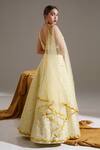 Shop_Shloka Sudhakar_Yellow Organza, Net, Suede Floral V Neck Embroidered Lehenga Set _at_Aza_Fashions