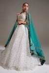 Buy_Shloka Sudhakar_White Raw Silk, Organza, Net Floral V Neck Embroidered Lehenga Set _at_Aza_Fashions