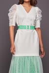 Deepika Arora_White Ponte Roma, Four Way Lycra V Neck Puff Sleeve Cutwork Dress_at_Aza_Fashions