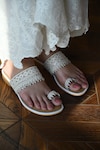 Buy_Miraki_White Embroidered Toe Ring Flats_at_Aza_Fashions