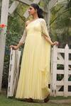 House of Tushaom_Yellow Georgette Embroidery Cutdana Asymmetric One Shoulder Draped Gown _at_Aza_Fashions