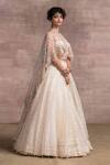 Tarun Tahiliani_White Silk Organza Brocade Embroidery Sweetheart Asymmetric Cape And Lehenga Set _Online_at_Aza_Fashions