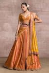 Buy_Tarun Tahiliani_Orange Brocade Embroidery Sweetheart Neck Draped Lehenga Set _at_Aza_Fashions