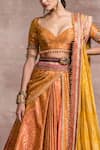 Buy_Tarun Tahiliani_Orange Brocade Embroidery Sweetheart Neck Draped Lehenga Set _Online_at_Aza_Fashions
