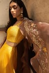 Radhika & Raghav_Yellow Silk Organza Embroidery Sequin Sweetheart Neck Cape Lehenga Set _Online_at_Aza_Fashions