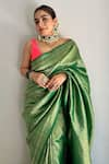 Buy_Devissha_Green Pure Katan Silk Handwoven Paisley Banarasi Saree _at_Aza_Fashions