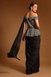 Shop_Sejal Kamdar_Black Pure Satin Crepe Print Ajrak Asymmetric Neck Peplum Saree Gown _at_Aza_Fashions