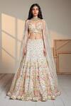 Buy Chamee And Palak Ivory Floral Pattern Plunge V Neck Calico Embroidered Lehenga And Blouse Set at Aza Fashions Buy_Chamee And Palak_Ivory Floral Pattern Plunge V Neck Calico Embroidered Lehenga And Blouse Set _at_Aza_Fashions