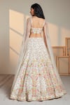 Shop Chamee And Palak Ivory Floral Pattern Plunge V Neck Calico Embroidered Lehenga And Blouse Set at Aza Fashions Shop_Chamee And Palak_Ivory Floral Pattern Plunge V Neck Calico Embroidered Lehenga And Blouse Set _at_Aza_Fashions