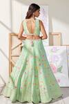 Shop_Chamee and Palak_Green Embroidered Floral Pattern Plunge V Neck Four Seasons Bridal Lehenga Set _at_Aza_Fashions
