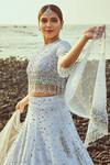 Buy_House of Musafir_White Raw Silk And Tulle Embellished Sequin Round Lehenga Set _at_Aza_Fashions