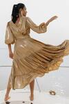 Shop_HOUSE OF FETT_Gold 100% Knit Fabric Plain V Neck Tiered Gown _at_Aza_Fashions