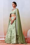 Buy_Isha Gupta Tayal_Green Organza Printed Floral V Neck Lehenga Set _at_Aza_Fashions