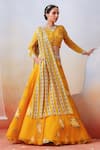 Buy_Isha Gupta Tayal_Yellow Organza Printed Floral Round Lehenga Set _at_Aza_Fashions