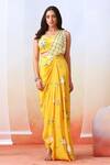 Isha Gupta Tayal_Yellow Crepe Printed Floral Sweetheart Neck Pre-draped Saree With Blouse _Online_at_Aza_Fashions