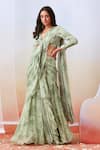 Isha Gupta Tayal_Green Georgette Printed Floral V Neck Pre-draped Saree With Blouse _Online_at_Aza_Fashions