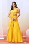 Buy_Isha Gupta Tayal_Yellow Crepe Printed Floral Round High Neck Draped Cape And Sharara Set _at_Aza_Fashions