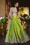 Buy Matsya Green Silk Dori, Zardozi And Mirror Work One The Iconic Winged Temple Lehenga Set Online at Aza Fashions Buy_Matsya_Green Silk Dori, Zardozi And Mirror Work One The Iconic Winged Temple Lehenga Set _Online_at_Aza_Fashions
