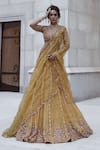 Buy_Neha Khullar_Yellow Tulle Embroidered Mirror Work Plunge V Neck Lehenga Set _at_Aza_Fashions