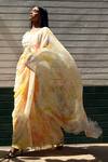 Shop_Surbhi Gupta_Yellow Georgette Tie-dye Pre-draped Saree With Blouse  _at_Aza_Fashions