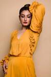 Babita Malkani_Yellow Italian Crepe Embroidered Bead Work V Neck Puff Sleeve Jumpsuit _at_Aza_Fashions