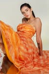 July Issue_Orange Organza Striped Straight Across Emma Strapless Gown_at_Aza_Fashions