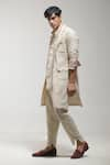 Buy_Jatin Malik_Beige Textured Geometrical Long Overcoat _Online_at_Aza_Fashions