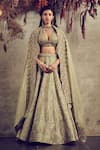 Buy_JAYANTI REDDY_Green Raw Silk V Neck Embroidered Bridal Lehenga Set  _at_Aza_Fashions