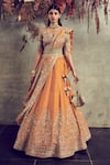 Buy_JAYANTI REDDY_Yellow Raw Silk V Neck Embroidered Bridal Lehenga Set  _at_Aza_Fashions