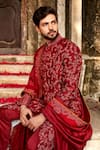 Shop_JAYANTI REDDY_Maroon Raw Silk Embroidered Sherwani Set_at_Aza_Fashions