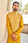 Shop_JAYANTI REDDY_Yellow Raw Silk Embroidered Chikankari Sequins Bundi And Kurta Set  _at_Aza_Fashions