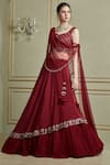 Charu and Vasundhara_Red Tussar Sweetheart Neck Layered Lehenga Set _Online_at_Aza_Fashions