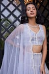 Shop_Charu and Vasundhara_Blue Net Embroidered Cage Motifs Leaf Neck Edonia Lehenga Set _at_Aza_Fashions