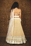 Shop_Nikita Vishakha_White Blouse Velvet Lehenga Mesh Dupatta Net Embroidered Sunehri Set _at_Aza_Fashions