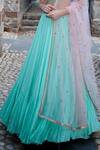 Keerthi Kadire_Green Raw Silk, Crepe Scoop Neck Blouse And Lehenga Set _at_Aza_Fashions